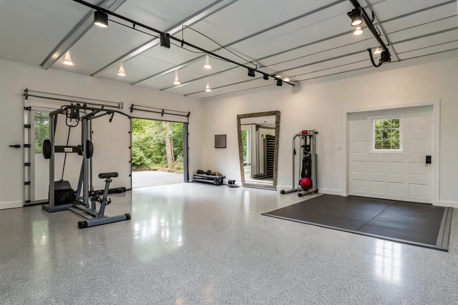 Converted home gym floor with epoxy coating in a Menai garage