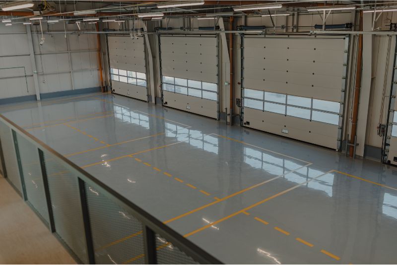 A photo of an empty, freshly finished epoxy floor