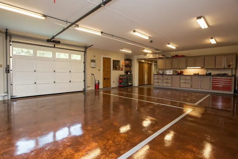Metallic epoxy garage flooring installation Sutherland Shire showing bronze copper finish